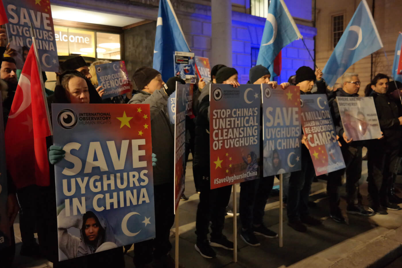 New footage reveals hundreds of blindfolded and shackled Uyghur prisoners